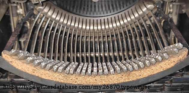 Type basket and cork rest, with front cover off.