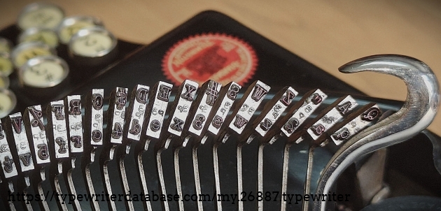 Type slug detail, left end of basket.