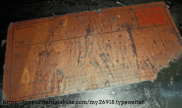 Shipping Label.  Barely visible on the case, Adams Express Company shipping label.