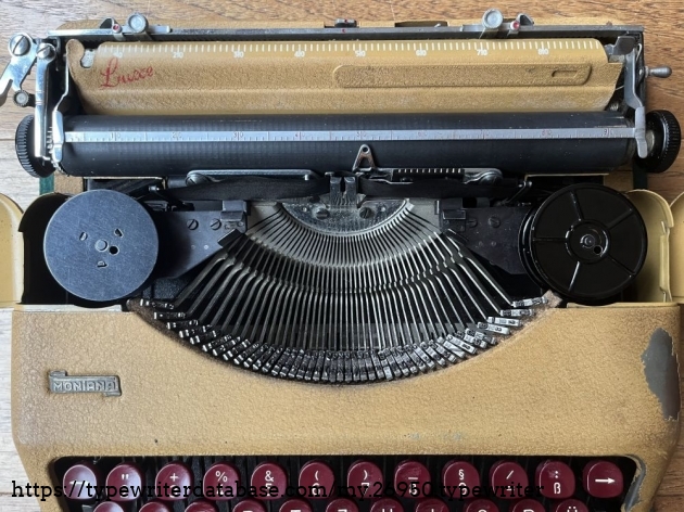 Detail: Ribbon covers opened