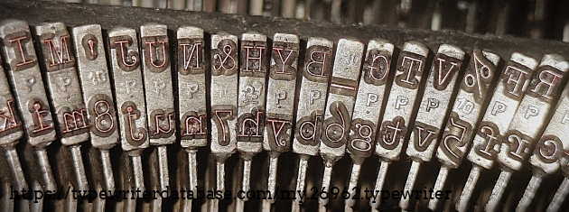 Typebar detail, middle set - showing "P" foundry marks for letters and "10" foundry marks for numeral/character keys.