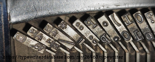 Type slug detail, right-end range, showing "UR" foundry marks.