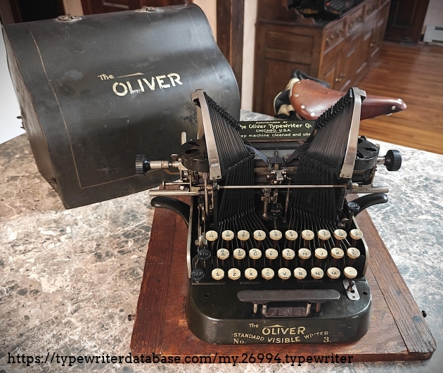 Typewriter with its case.