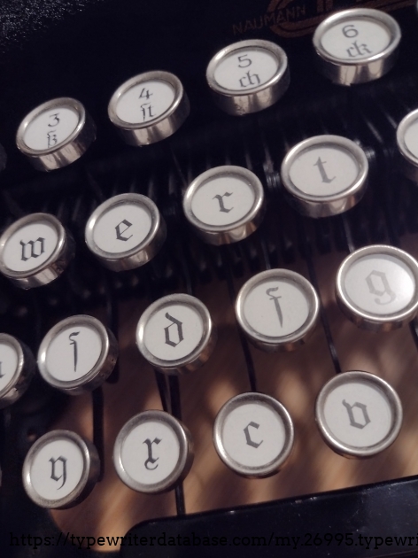 Top row see ligatures. Please note that the digits require shift key which has caused the corrections in theface specimen. And yes, the s looks like f.