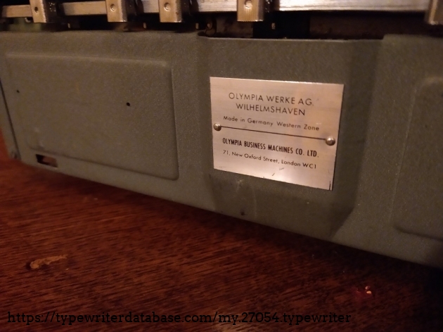 Distributor plaque on the back of the machine