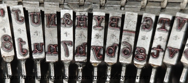 Type slug detail, showing number 1 typeface marking (Pica).