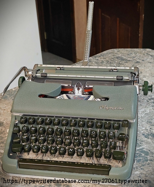 Front oblique angle - paper rest extended.