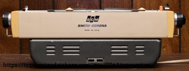 Both carriage release levers are missing their handles.