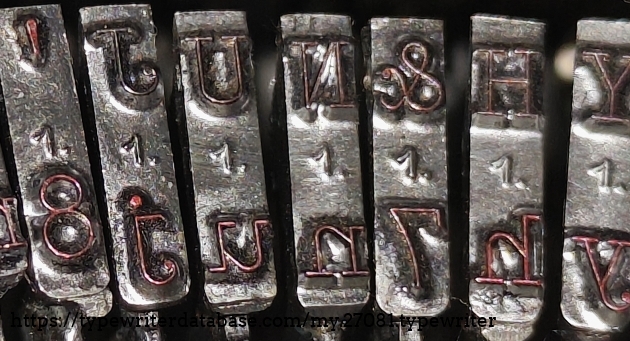Type slug detail, showing number 1 typeface marking (Pica).
