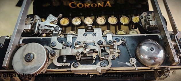 Escapement mechanism (escapement cover removed).
