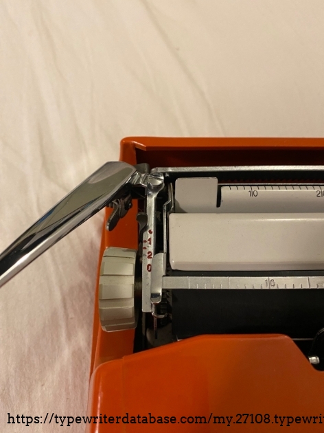 This is where the line spacing setting is and the carriage lock!