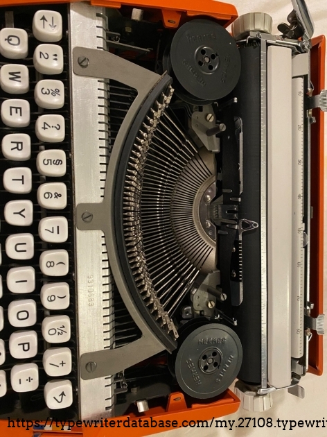 Here is a view of the serial number and under the machines cover!