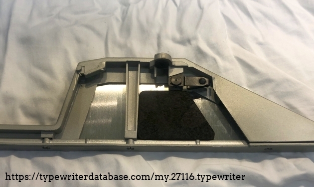 a side wall mounted on the frame