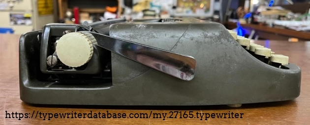 The floppy carriage return lever.