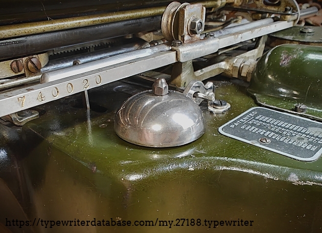 Bell and carriage rail serial number.