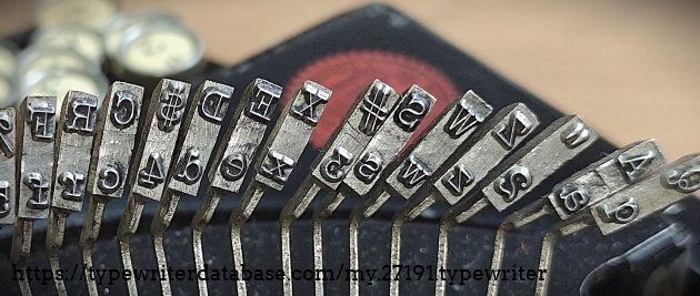 Type slug closeup, left end of basket.