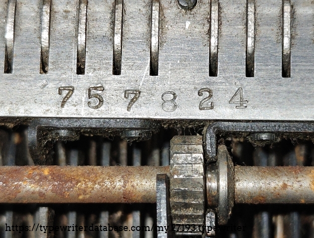 Linkage mount serial number underside.