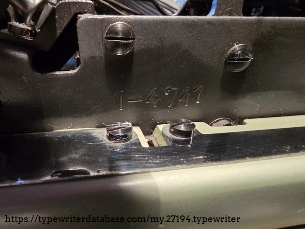 The serial code. Found on the side of the machine under the 'hood'.