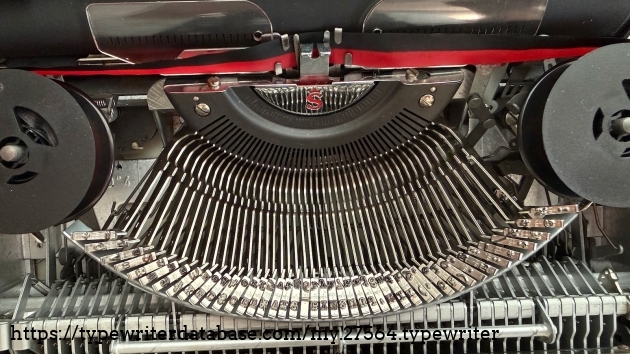 Close up of slugs. I believe it is Elite No. 8, 11 pitch, a  common typeface.