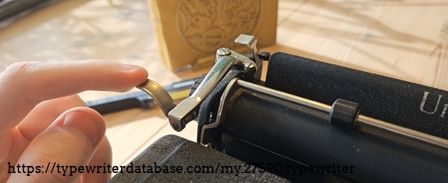 the spring loaded lever