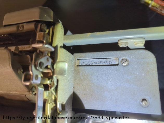 Serial number, under the right side of carriage.