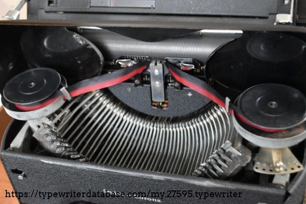 Under the hood.  The type arms and carriage all ride on ball bearings.