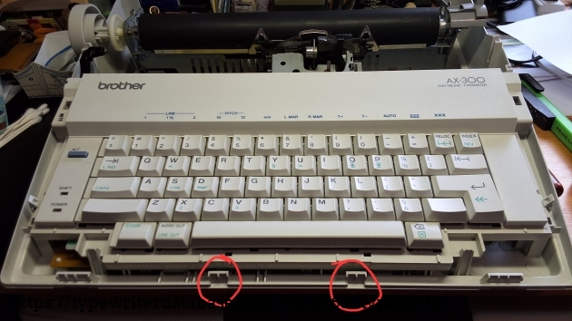 View of the front hooks that should be the first to be released when removing the cover, and the last to click back in when re-assembling the cover.