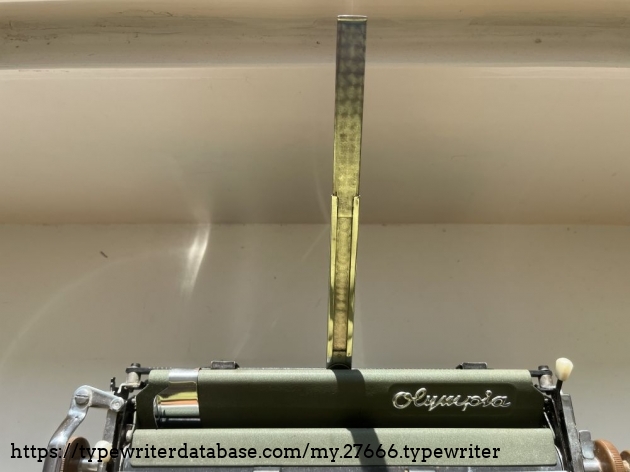 Detail: paper support with telescopic mechanism