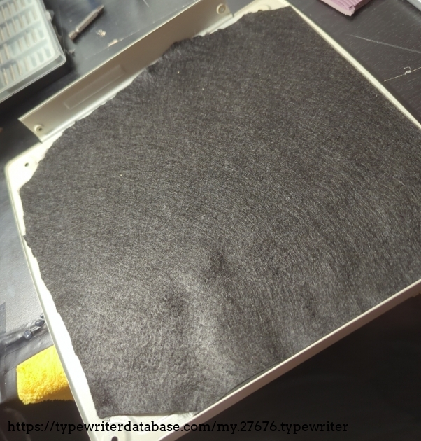 Felt sheet attached to the bottom exterior panel.