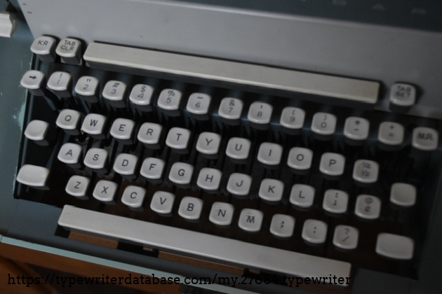 I really admire the depressions in the key tops that hug the ball of your finger tips as one types.  For some reason, I have always loved how Remington keys felt as you type.  Note the long tab key up top with the tab functions flanking the tab key.