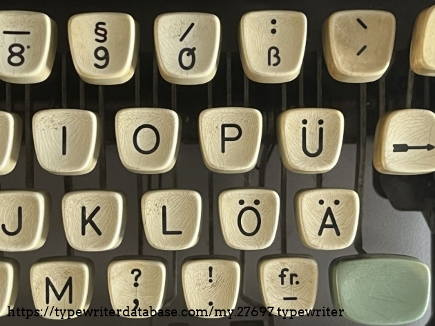 Detail: keyboard special characters: German &auml;, &ouml;, &uuml; and &szlig;, as well as a NATO-customised "striked zero" and a "fr." - I don't know what it means; one hypothesis may be that the machine was used by the Franco-German Brigade and that the "fr." is a currency symbol for the former French Francs.