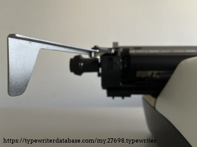 Detail: carriage return lever