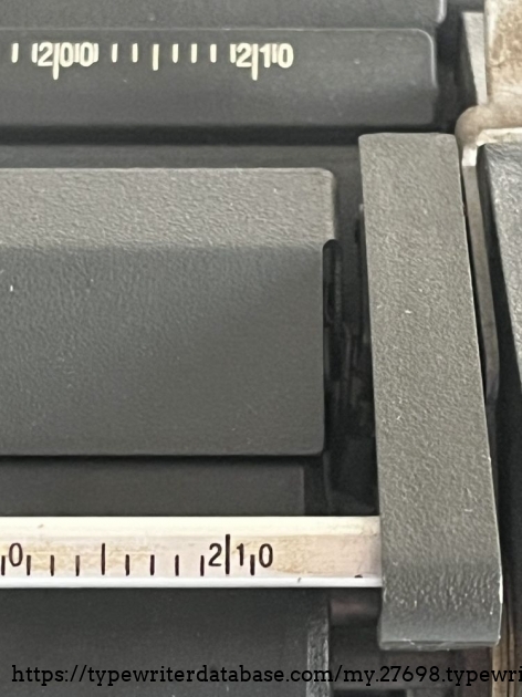 Detail: right margin - this typewriters goes more than 210 at the max.
