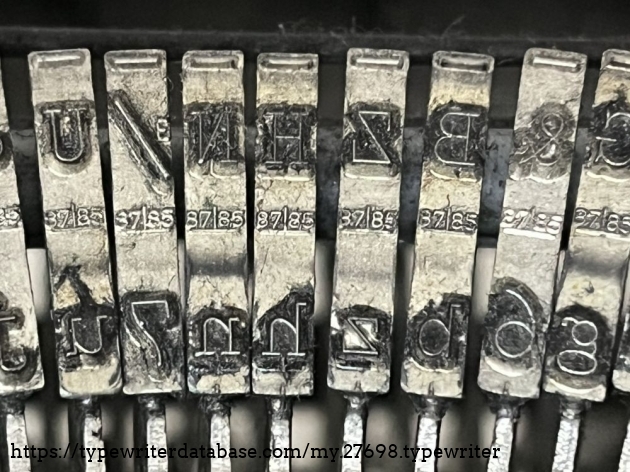 Detail: type slugs, Schmale Perl (87|8,5), Elite 12pt