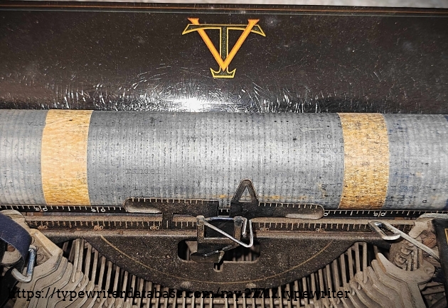 Front platen view with ribbon guides.