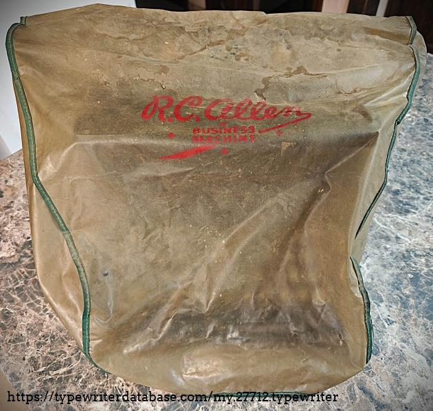R. C. Allen Business Machine cover that came with the purchase of this Victor 3 machine.  Stained, but good quality!