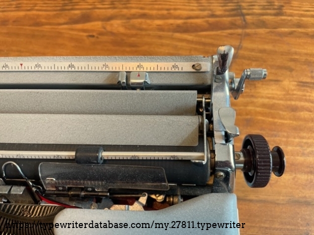 Right margin set and tab clear lever.