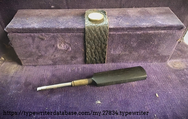 Case compartment with screwdriver that came with it.