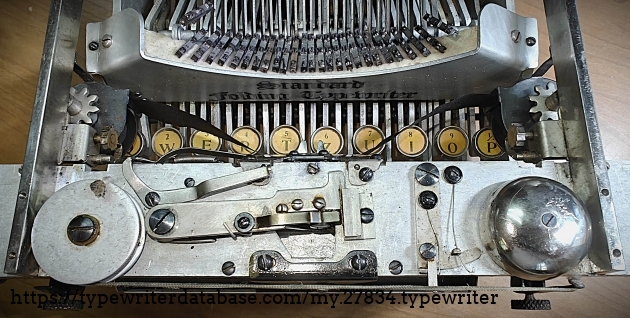 Cover off, showing escapement mechanism.