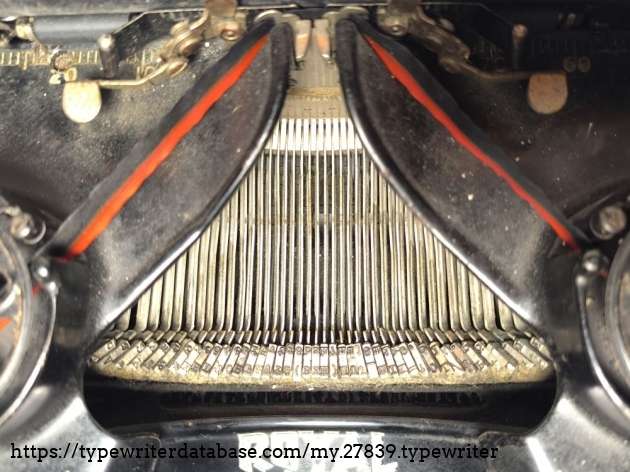 Typebar basket: I like the design of the metal roof that extends over the typebars.