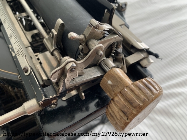 Line space mechanism - as well as my hand carved wooden carriage knob that serves temporary use while I hunt for a replacement.