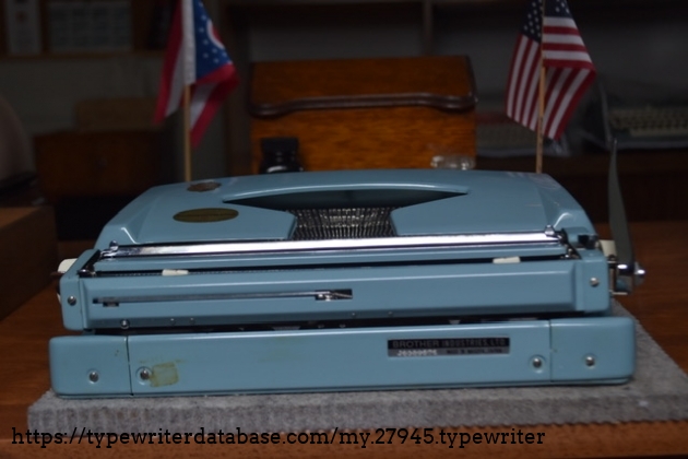 Rear of machine where serial number plate resides and spring loaded paper rest hides.