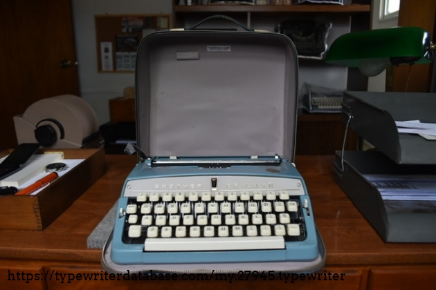 Typewriter in carrying case.