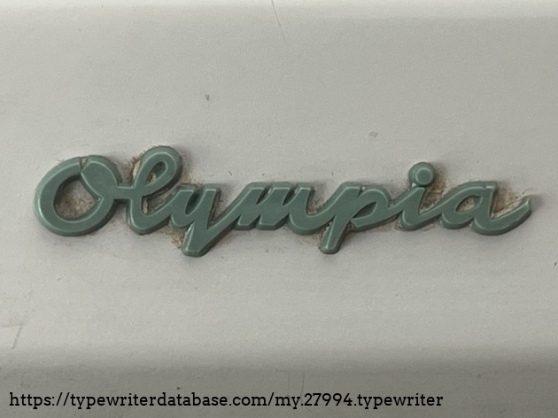 Detail: "Olympia" lettering in only-1964-turquoise