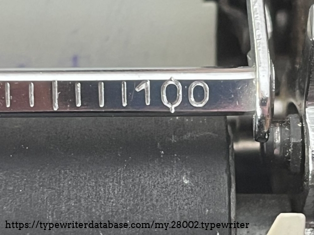 Detail: paper bail; pos. 100 corresponds to the width of the "Perl" typeface