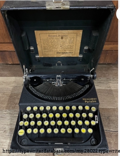 Typewriter in case.
