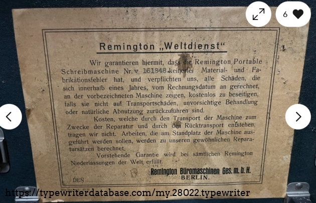 Inside top case warranty label, showing a serial number for the machine of "v 161848".