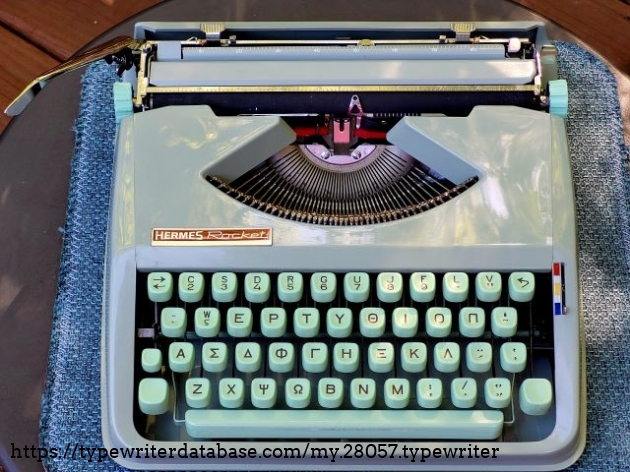 Typewriter with both 3D printed replacement knobs attached and painted to match the original color.