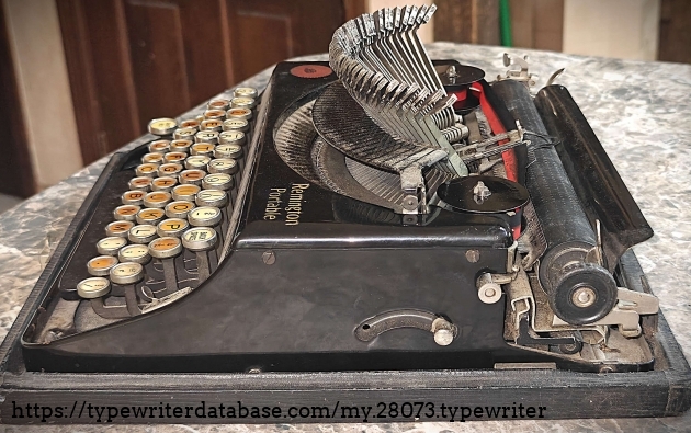 Right broadside with typebars extended.