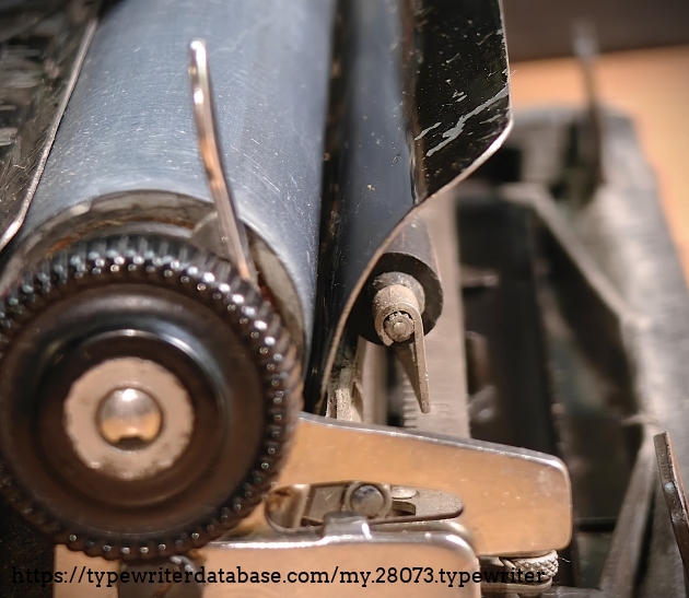 Right carriage end view for #NX13194.  Note the much more gradual bend in the paper table.